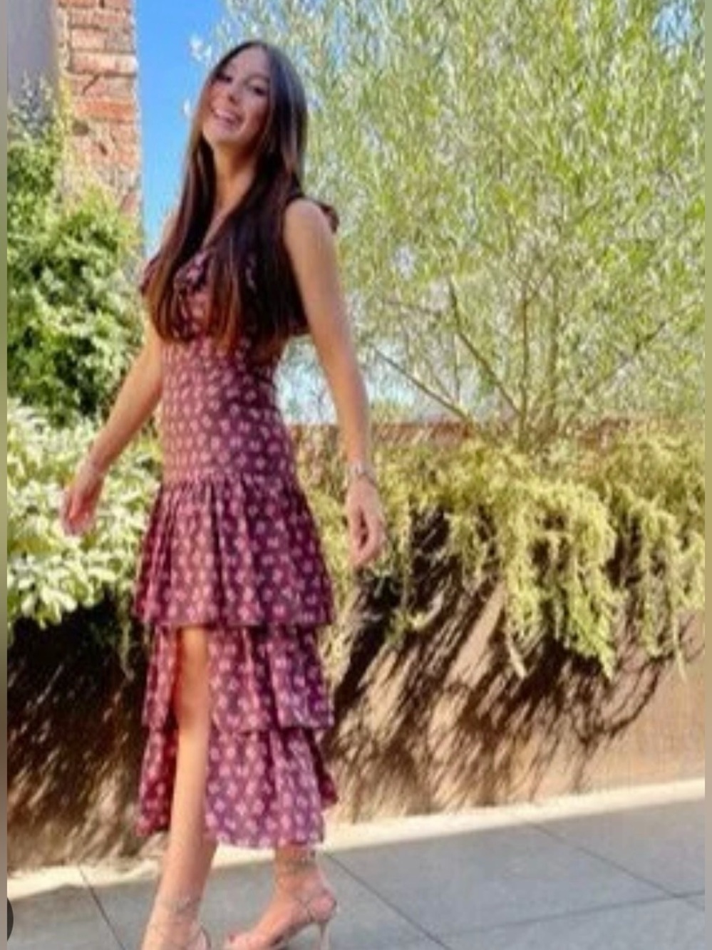 Likely Black Dress with Pink Floral Print and Ruffle Tiers